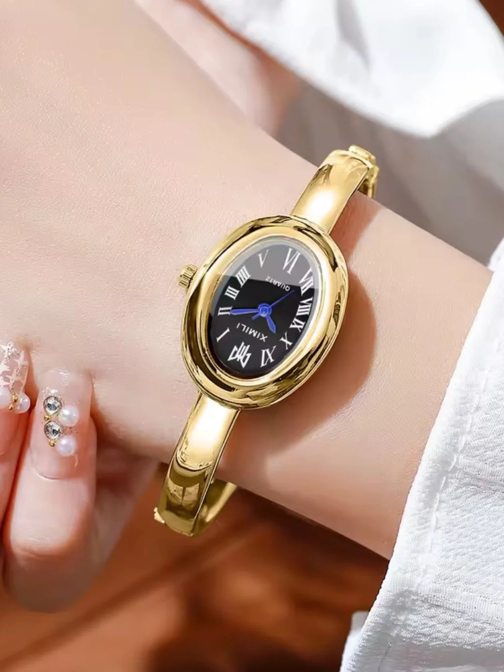 Elegant Gold-Tone Stainless Steel Bangle Watch - Picture 5 of 15